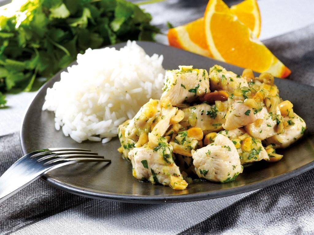 Kip met pindanoten en sinaasappelsap in de ActiFry - Recepten Actifry Original 1kg | Tefal