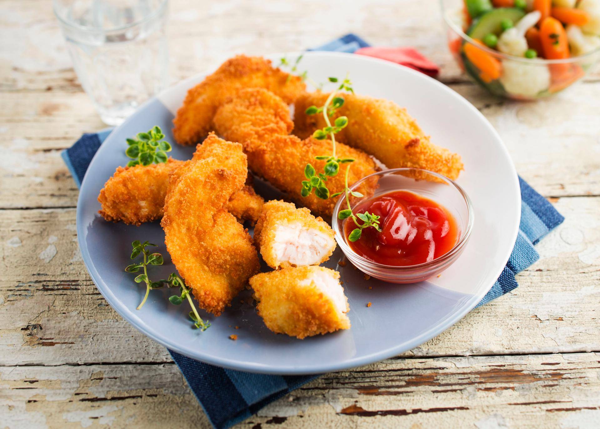 Gepaneerde kipfilet - Recepten Actifry Smart 1kg | Tefal