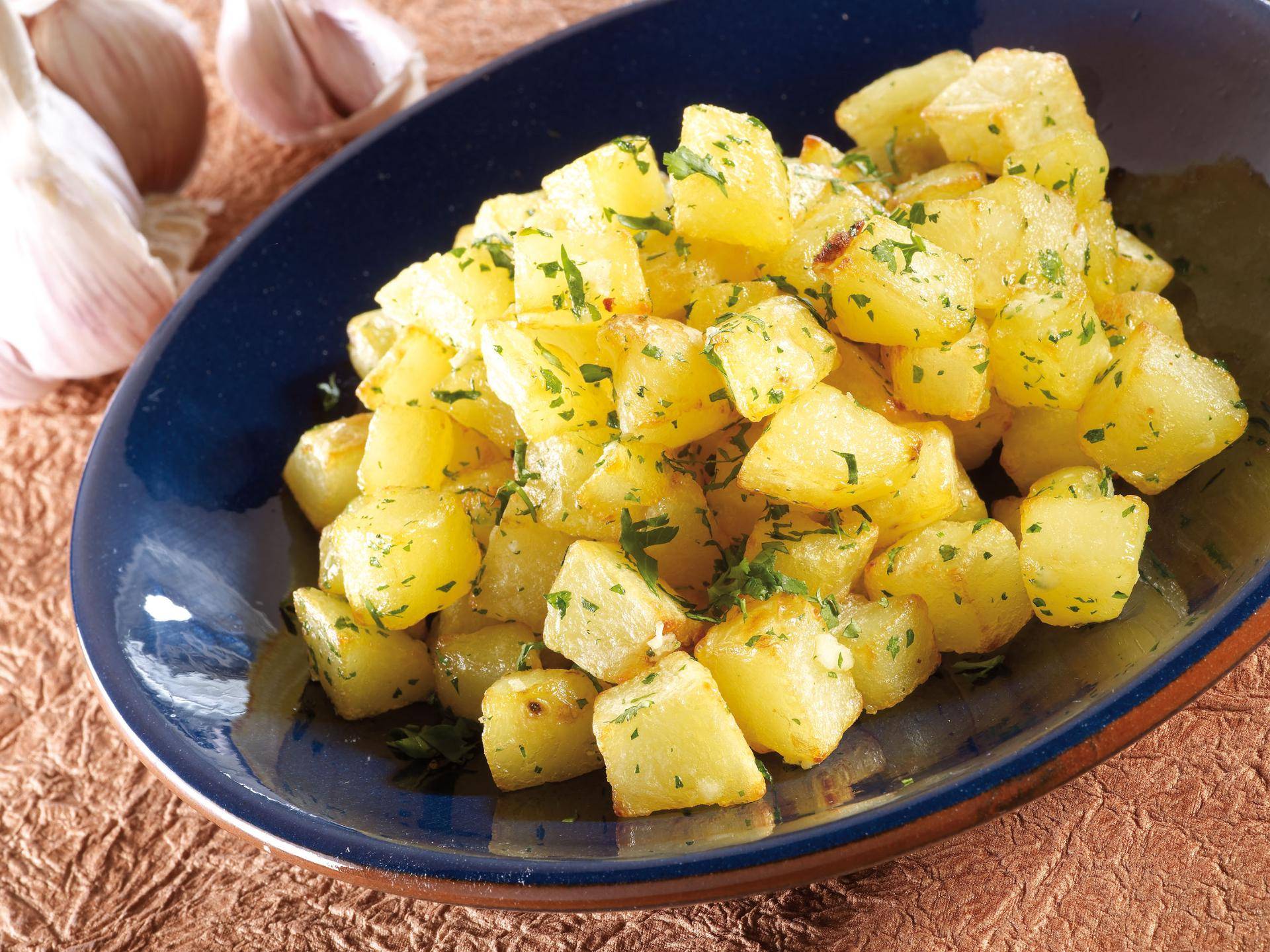 Aardappelen met knoflook en koriander - Recepten Actifry Genius | Tefal