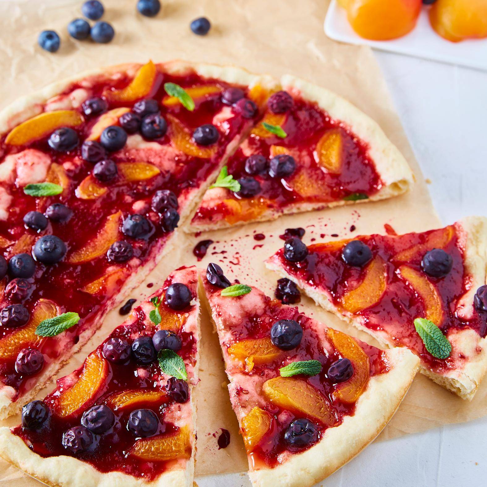 Zoete pizza met abrikozen en blauwe bessen - Recepten Easy Fry XL Surface | Tefal