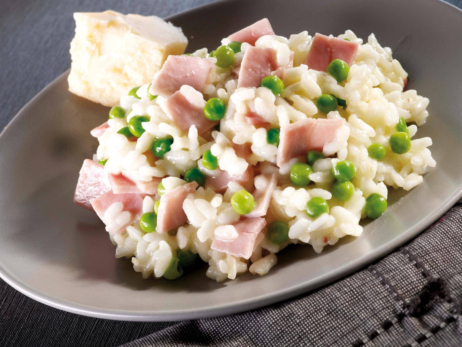 Lichte risotto met olie, ham en erwten - Recepten Actifry Original 1kg | Tefal