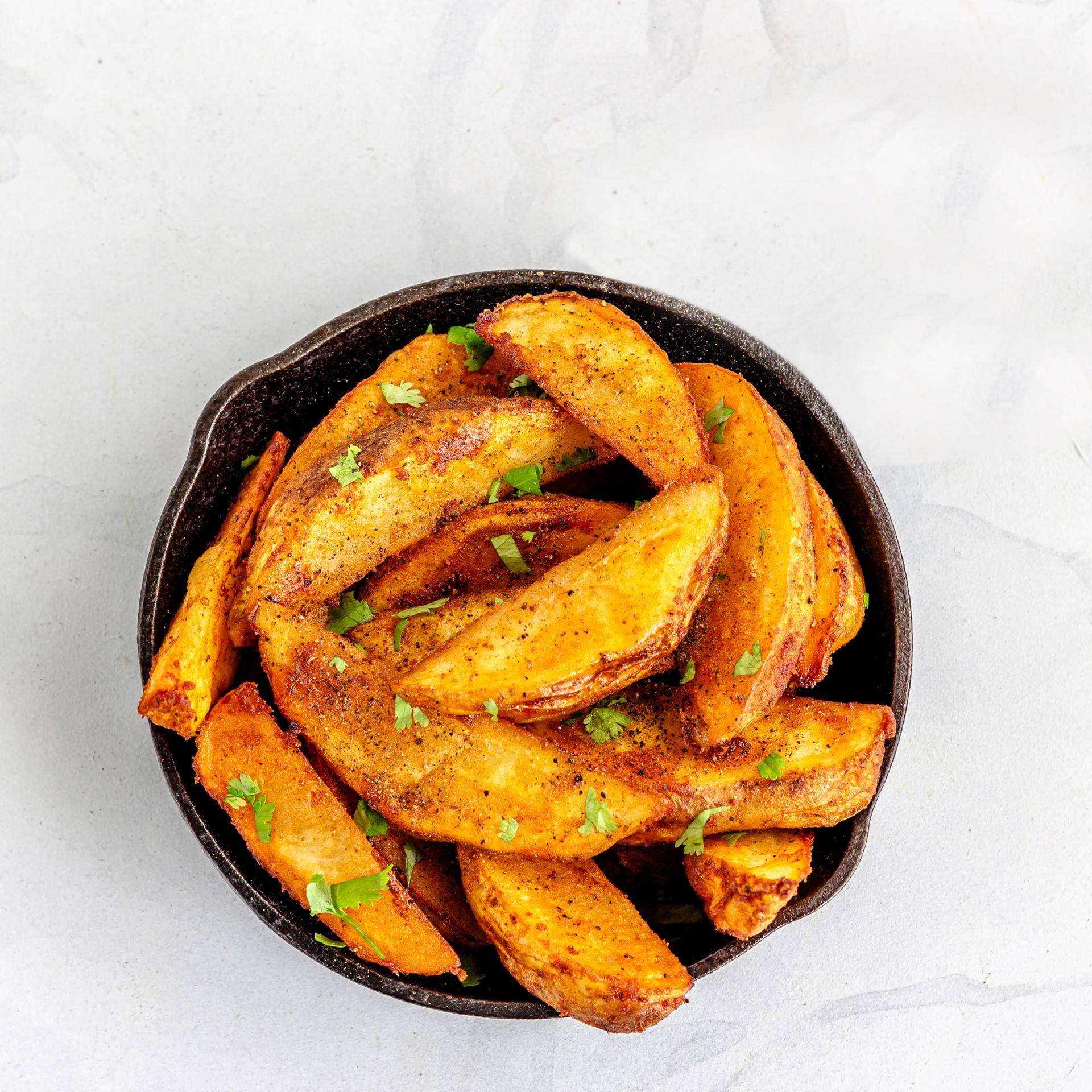 Kerrie-aardappelen - Recepten Easy Fry Mega | Tefal